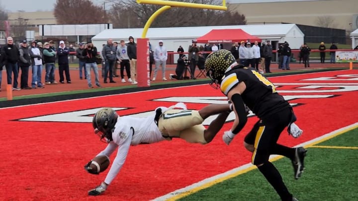 Belle Vernon's Anthony Crews dives into the end zone for a touchdown in the 2023 PIAA Class 3A state championship game. Belle Vernon defeated Northwestern Lehigh 38-7. 