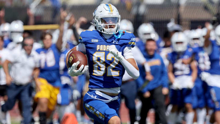 Serra wide receiver Charlie Wiley (82) is one of the few key returning starters from last year's squad. Here he scored on an 80-yard catch and run during a 21-14 opening win over Folsom to start the 2023 season. 