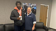 Tristian Givens and Bill Belichick share a moment on a North Carolina recruiting visit. 