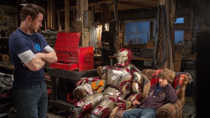 Robert Downey Jr. as Tony Stark and Ty Simpkins as Harley Keener in Iron Man 3