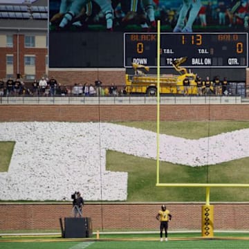 Mar 16, 2024; Columbia, MO, USA; Two Members of the Gold team await a kickoff during the Missouri Tigers' annual Black & Gold Spring Game at Faurot Field.