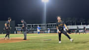 RJ Machado of American Heritage (right) rejoices after scoring the winning run in the Class 4A state semifinals in eight innings.