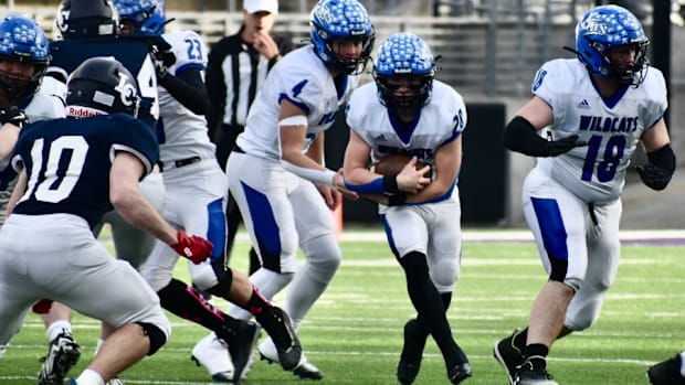 Behind its power rushing attack, second-seeded Wilbur-Creston-Keller upended No. 1 seed Liberty Christian, 42-34, to win 1B.