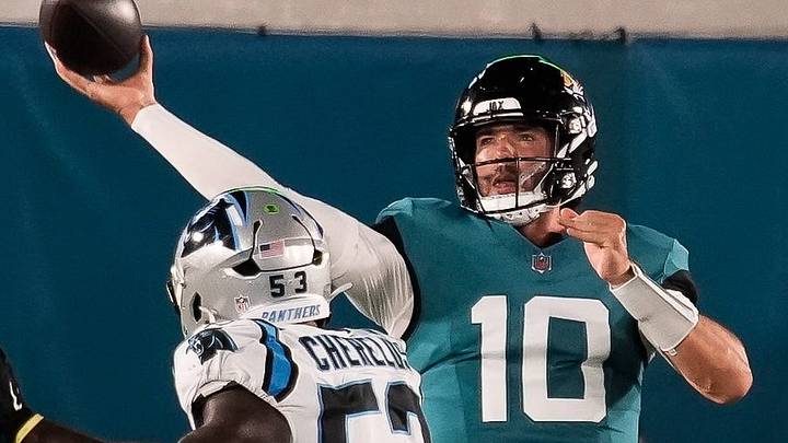 Carolina Panthers linebacker Claudin Cherelus (53) pressures Jacksonville Jaguars quarterback Carter Bradley (10) in the second quarter during the first half against the Carolina Panthers at EverBank Stadium in the second preseason game on Friday night, August 21, 2026 in Jacksonville, Fla. 