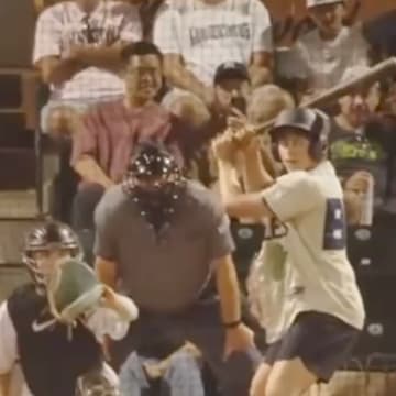 A fan at a Portland Pickles college summer league game hit a two-home run after being invited to take an at-bat. 