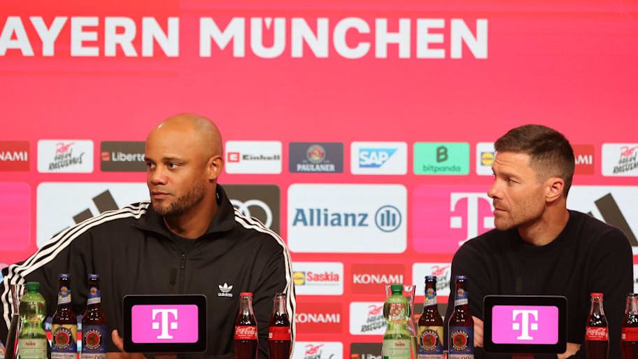 Vincent Kompany and Xabi Alonso