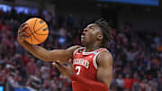 Arkansas Razorbacks guard Adou Thiero drives for a layup against the Texas Tech Red Raiders in the Sweet 16.