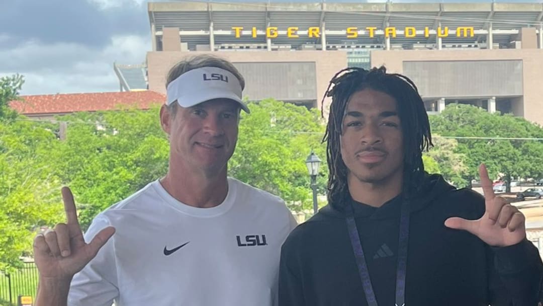 LSU head coach Lane Kiffin with recruiting Target Aden Starling