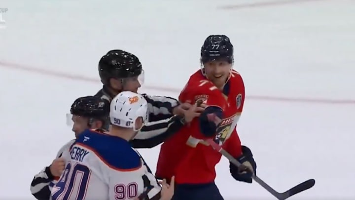 Florida Panthers defenseman Niko Mikkola and Edmonton Oilers forward Corey Perry are separated by officials after Game 3 of the Stanley Cup Final. Florida Panthers defenseman Niko Mikkola and Edmonton Oilers forward Corey Perry are separated by officials after Game 3 of the Stanley Cup Final.