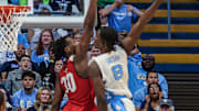 North Carolina forward Caleb Wilson loading up for a posterizing dunk over Winston-Salem State forward Abou Camara.; Oct. 29, 2025