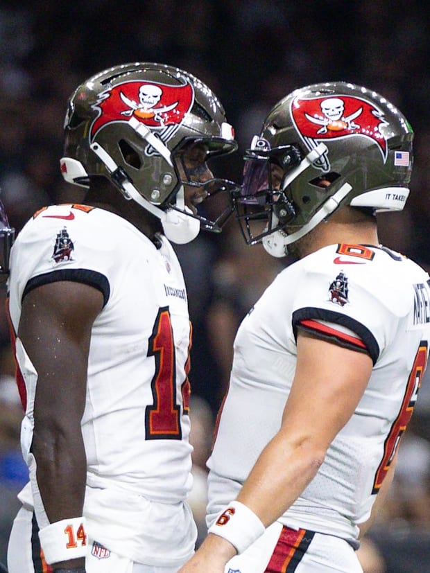 ampa Bay Buccaneers wide receiver Chris Godwin (14) and quarterback Baker Mayfield (6)