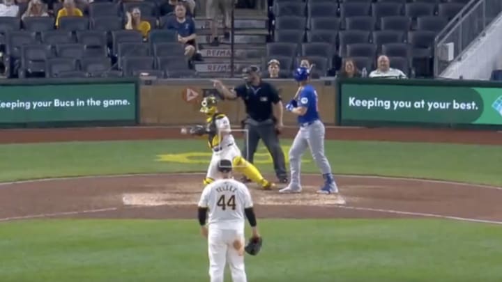 Rowdy Tellez pitches against Patrick Wisdom in the top of the ninth inning at PNC Park.