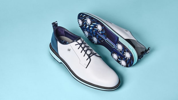 White and blue FootJoy golf shoes.