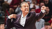 John Calipari points from the sideline in his first official game as Razorback head coach against Lipscomb. The Razorbacks won 76-60.
