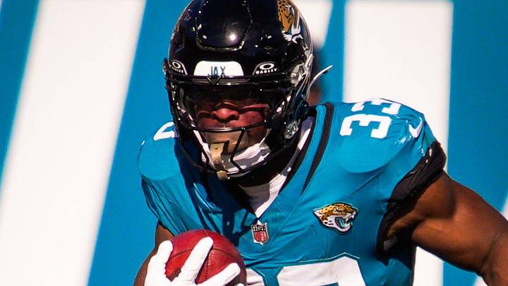 Jacksonville Jaguars running back Bhayshul Tuten (33) returns a kick off in the first quarter during an NFL football game at EverBank Stadium, Sunday, Dec. 14, 2025, in Jacksonville, Fla. 