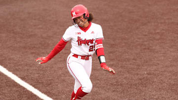 Nebraska's Samantha Bland poses as she approaches home plate after hitting one of her three home runs against Iowa on April 5, 2025.