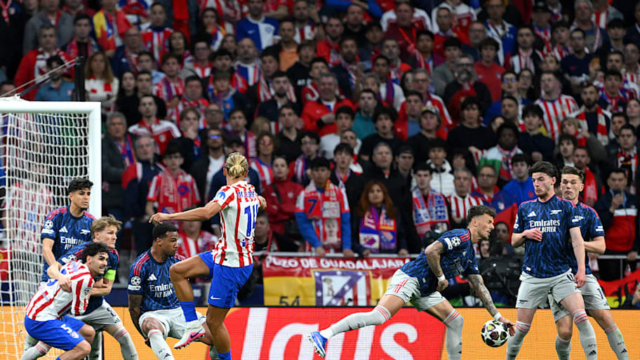 Ben White (middle right) gifted Atlético Madrid a clumsy penalty. 