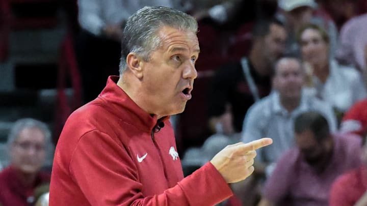 Arkansas Razorbacks coach John Calipari directing DJ Wagner in the exhibition opener against the Kansas Jayhawks at Bud Walton Arena in Fayetteville, Ark. Arkansas Razorbacks coach John Calipari directing DJ Wagner in the exhibition opener against the Kansas Jayhawks at Bud Walton Arena in Fayetteville, Ark.