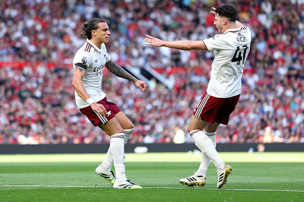 Riccardo Calafiori celebrates with Declan Rice