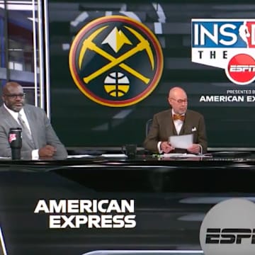 Shaquille O'Neal (far left), Kenny Smith (third from the left), and Charles Barkley (far right) were not ready for this statistic from Ernie Johnson (second from the left). 