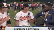Gunnar Henderson and Adley Rutschman speak with David Ortiz before the 2024 MLB Home Run Derby