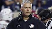 Sep 26, 2025; Charlottesville, Virginia, USA; Florida State Seminoles head coach Mike Norvell looks on during a stoppage in play against the Virginia Cavaliers at Scott Stadium. Mandatory Credit: Geoff Burke-Imagn Images