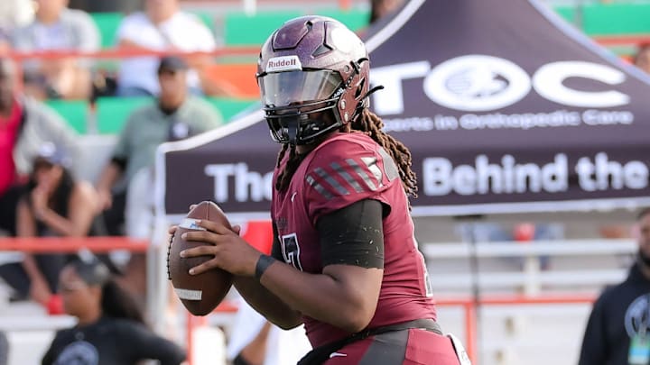 Miami Norland quarterback Ennio Yapoor rushed for his team's first touchdown of the night and then completed a game-winning touchdown pass with just 24.5 seconds left in the fourth quarter, as the Vikings knocked off American Heritage, 32-27.