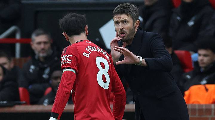 Michael Carrick (right) has buried the hatchet with Bruno Fernandes. Michael Carrick (right) has buried the hatchet with Bruno Fernandes.