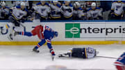New York Rangers winger Matt Rempe knocks over St. Louis Blues forward Jake Neighbours.