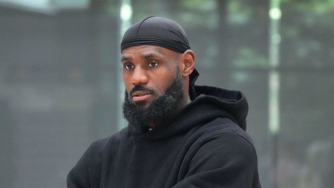 Jul 2, 2024; El Segundo, CA, USA; Los Angeles Lakers forward LeBron James watches at a press conference at the UCLA Health Training Center. Mandatory Credit: Kirby Lee-USA TODAY Sports