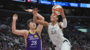 Jul 5, 2024; Los Angeles, California, USA; Las Vegas Aces center A'ja Wilson (22) shoots the ball against LA Sparks center Li Yueru (28) in the second half at Crypto.com Arena. Mandatory Credit: Kirby Lee-USA TODAY Sports