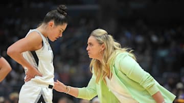 Jul 5, 2024; Los Angeles, California, USA; Las Vegas Aces coach Becky Hammon (right) talks with guard Kelsey Plum (10) in the second half against the LA Sparks at Crypto.com Arena. Mandatory Credit: Kirby Lee-Imagn Images