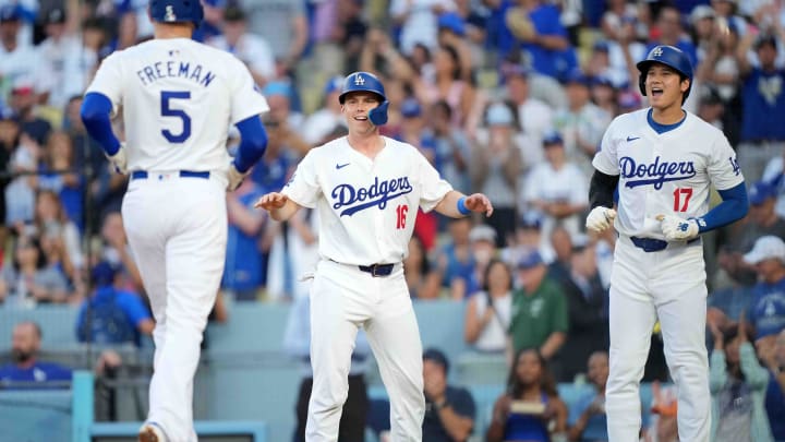 Jul 3, 2024; Los Angeles, California, USA; Los Angeles Dodgers first baseman Freddie Freeman (5) celebrates with catcher Will Smith (16) and designated hitter Shohei Ohtani (17) after hitting a three-run home run in the first inning against the Arizona Diamondbacks at Dodger Stadium. Mandatory Credit: Kirby Lee-USA TODAY Sports Jul 3, 2024; Los Angeles, California, USA; Los Angeles Dodgers first baseman Freddie Freeman (5) celebrates with catcher Will Smith (16) and designated hitter Shohei Ohtani (17) after hitting a three-run home run in the first inning against the Arizona Diamondbacks at Dodger Stadium. Mandatory Credit: Kirby Lee-USA TODAY Sports