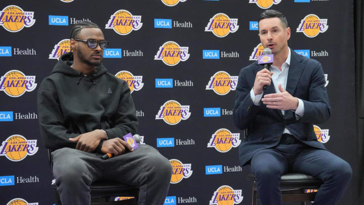 Jul 2, 2024; El Segundo, CA, USA; Los Angeles Lakers coach JJ Redick (right) and second-round draft pick Bronny James at a press conference at the UCLA Health Training Center. Mandatory Credit: Kirby Lee-USA TODAY Sports