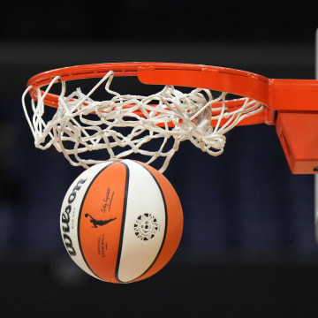 Wilson official basketball with WNBA logo goes through the net 