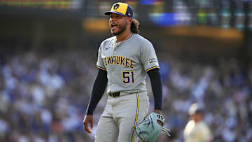 Jul 6, 2024; Los Angeles, California, USA; Milwaukee Brewers starting pitcher Freddy Peralta (51) celebrates at the end of the of the fourth inning against the Los Angeles Dodgers at Dodger Stadium. Mandatory Credit: Kirby Lee-USA TODAY Sports
