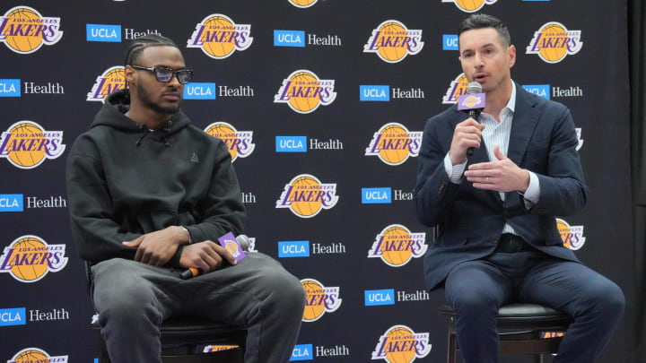 Jul 2, 2024; El Segundo, CA, USA; Los Angeles Lakers coach JJ Redick (right) and second-round draft pick Bronny James at a press conference at the UCLA Health Training Center. Mandatory Credit: Kirby Lee-USA TODAY Sports