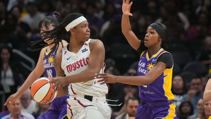 Washington Mystics forward Myisha Hines-Allen (left) is defended by LA Sparks forward Rickea Jackson (right) in the first half at Crypto.com Arena