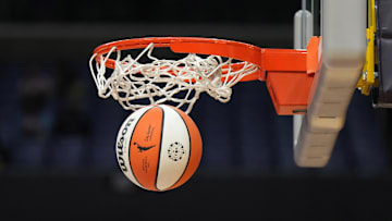 May 25, 2023; Los Angeles, California, USA; Wilson official basketball with WNBA logo goes through the net during the game between the LA Sparks and the Las Vegas Aces at Crypto.com Arena. Mandatory Credit: Kirby Lee-Imagn Images