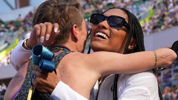 Jun 30, 2024; Eugene, OR, USA; Nikki Hiltz (left) embraces Tara Davis after winning the women's 1,500m in a meet record 3:55.33 during the US Olympic Team Trials at Hayward Field. 