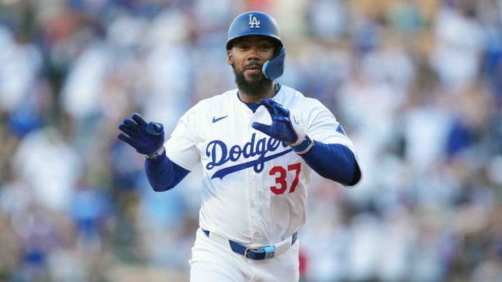 Los Angeles Dodgers left fielder Teoscar Hernandez (37) gestures after hitting a home run. Los Angeles Dodgers left fielder Teoscar Hernandez (37) gestures after hitting a home run.