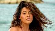 Denise Bidot was photographed by Yu Tsai in Jamaica. Swimsuit by Zimmermann.