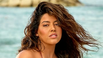 Denise Bidot was photographed by Yu Tsai in Jamaica. Swimsuit by Zimmermann.