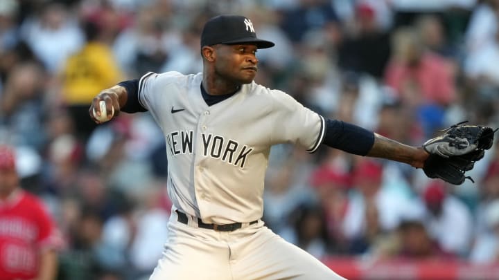 Jul 18, 2023; Anaheim, California, USA; New York Yankees starting pitcher Domingo German (0) throws against the Los Angeles Angels in the third inning at Angel Stadium. Mandatory Credit: Kirby Lee-USA TODAY Sports