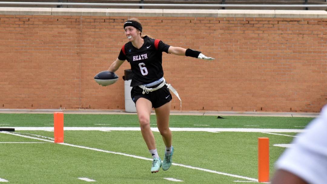 Rockwall-Heath's Olivia Richard celebrates after her first-half touchdown against Houston Memorial in the Texas Girls Flag Football Championship on June 14 in Denton.