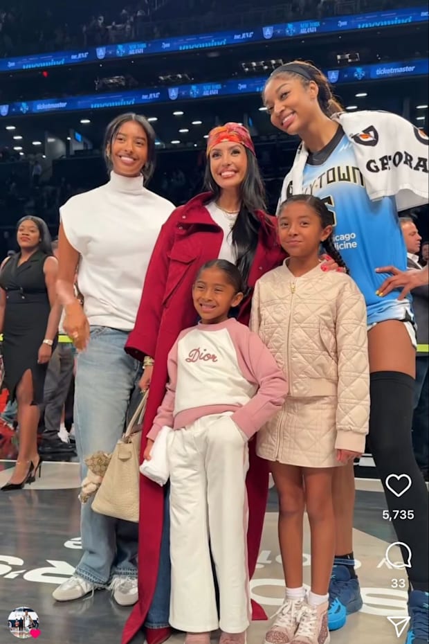 Angel Reese with the Bryant family