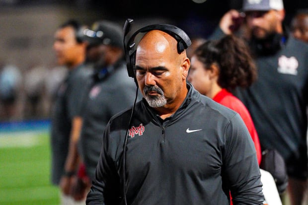 First-year Mater Dei football coach Raul Lara coaching in his debut against Corona Centennial on Thursday, Aug. 22, 2023.