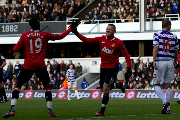 Danny Welbeck, Wayne Rooney celebrate a Man Utd goal.