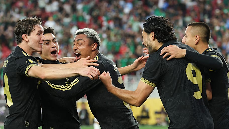 Mexico national team players celebrating. 