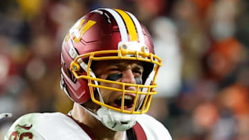 Washington Commanders tight end Zach Ertz reacts after a catch against the Denver Broncos.